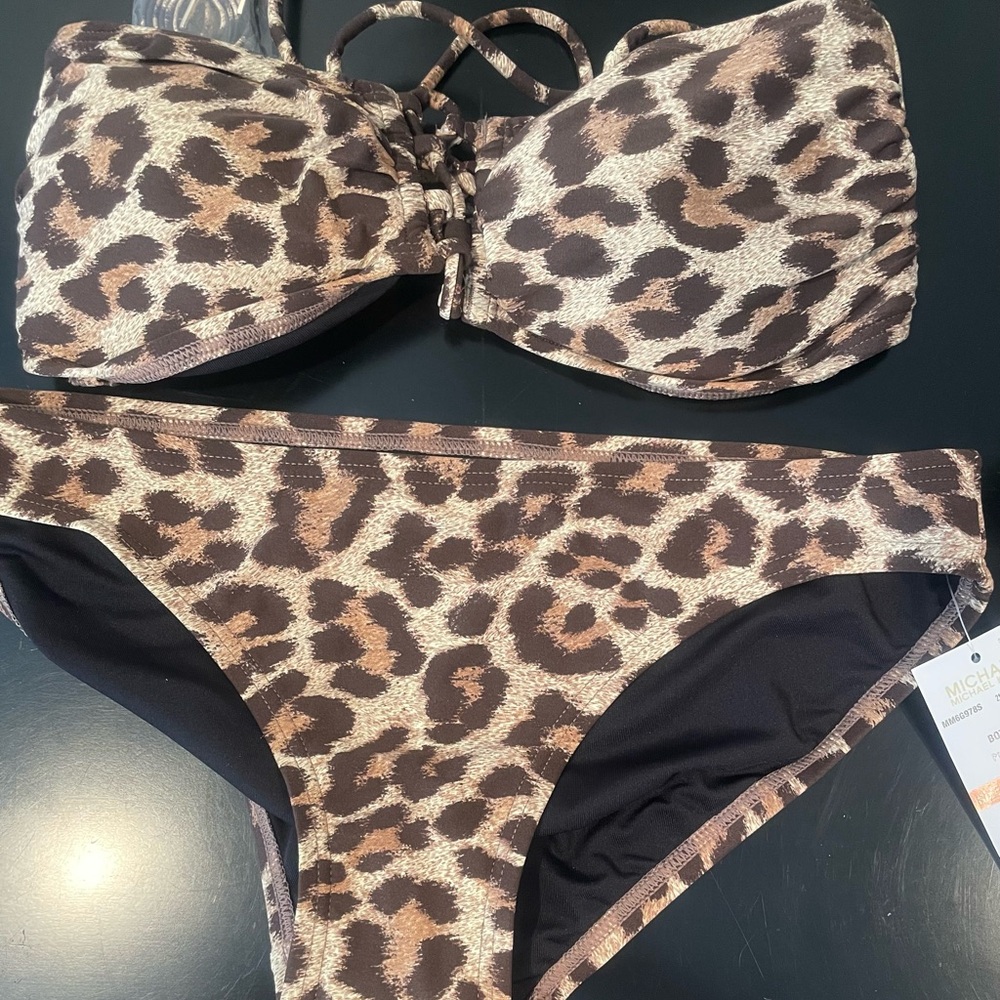 Beautiful two piece Micheal Kors bathing suit.  New with tags.